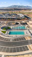 Drone / aerial view of a pool and mountains