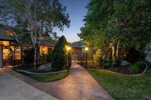 View of property hidden behind natural elements