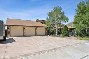 View of front of home featuring concrete driveway