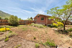 View of fenced backyard