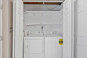 Laundry room with washer and dryer