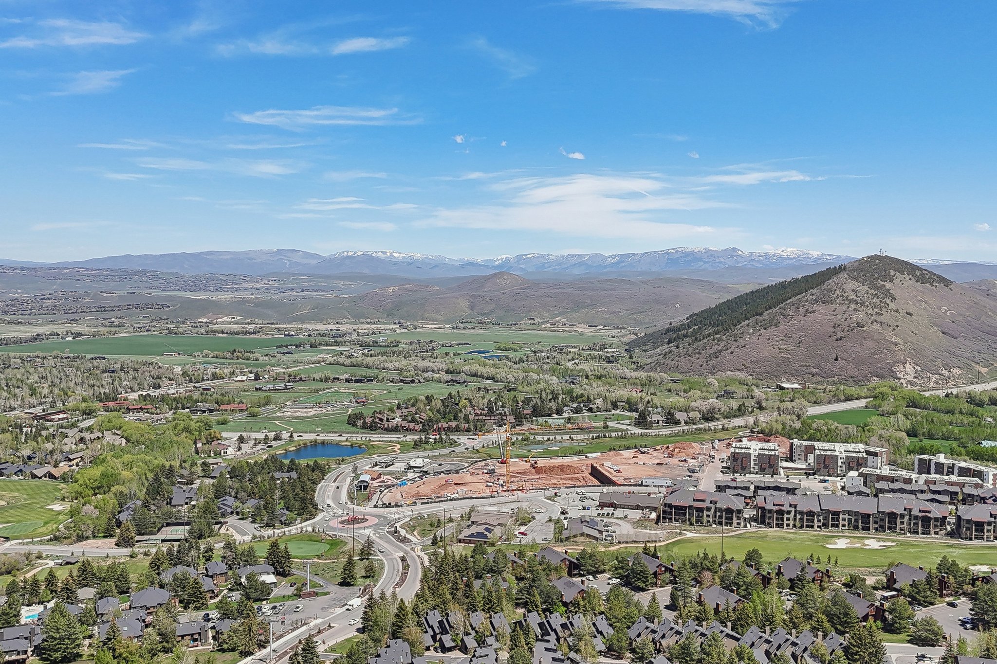View of property location featuring a water and mountain view