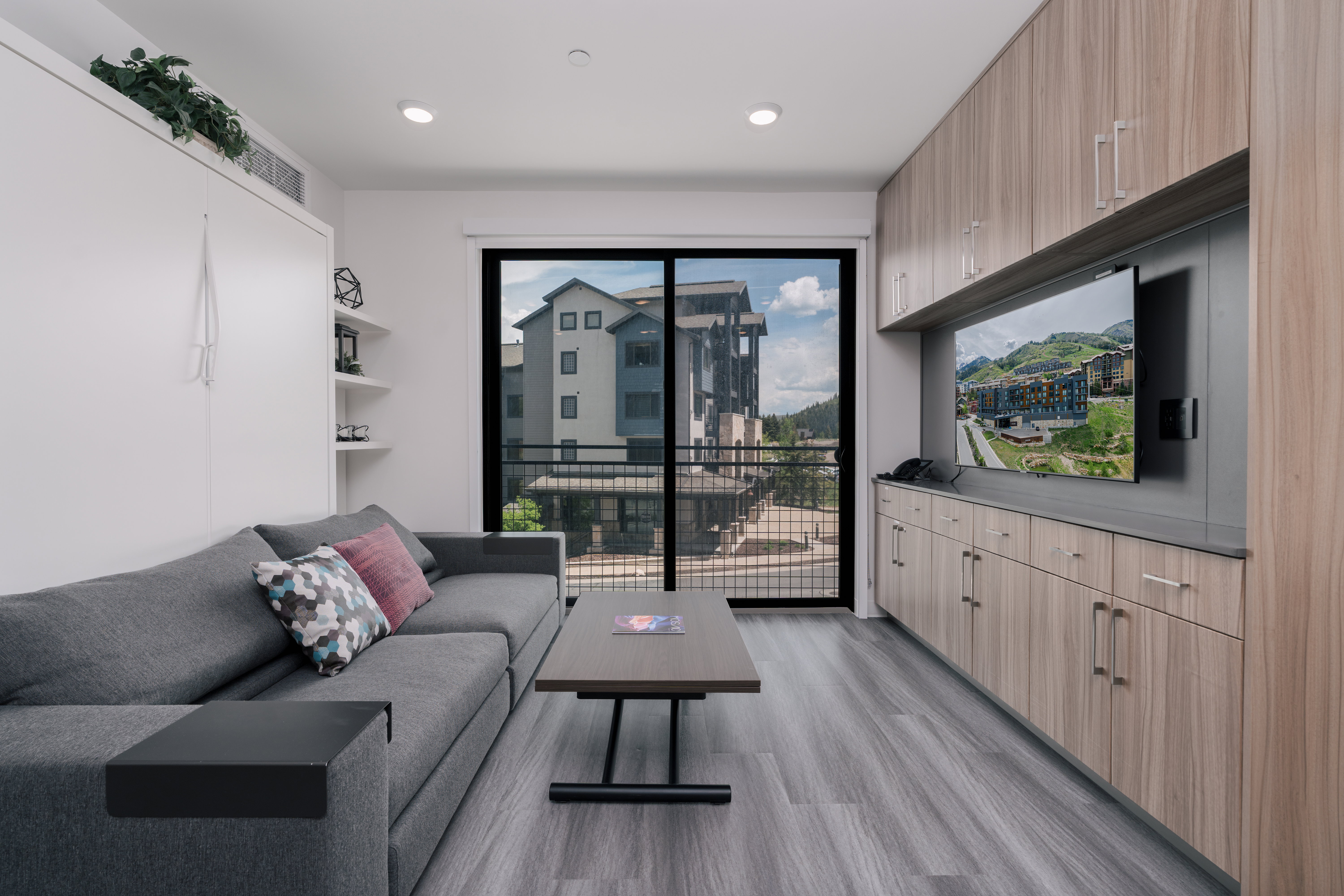 Living area featuring light wood-style flooring