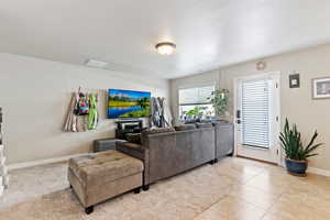 Living room featuring baseboards