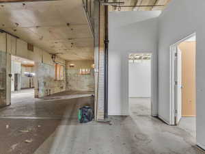 Hall with concrete flooring