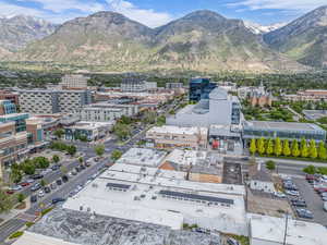 View of mountain background featuring nearby urban area