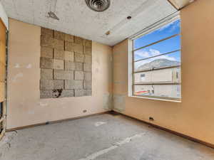 Spare room with baseboards