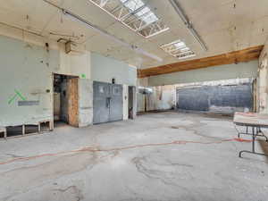 Miscellaneous room featuring concrete flooring