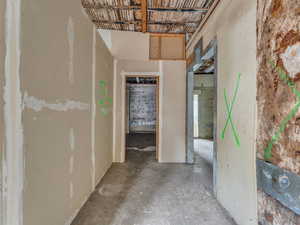 Hall featuring concrete floors