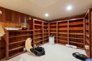 Wine cellar featuring recessed lighting and carpet floors