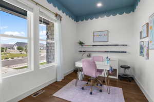 Main floor level flex room with seperate outside front entrance with powder room.