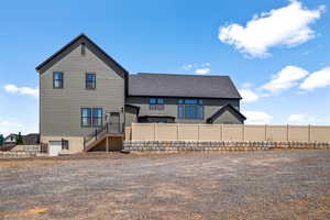 Back of house with apartment access
