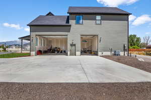 East side of property with garages and apartment above.