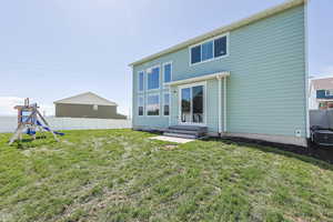 Back of property featuring central AC unit