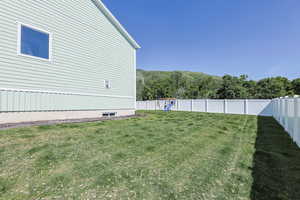 View of yard with a playground