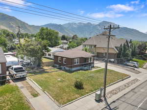View of mountain backdrop with nearby suburban area