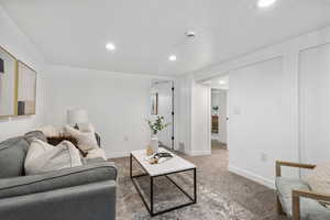 Living room featuring recessed lighting and carpet floors