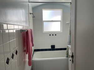 Full bath with shower / tub combo and vanity