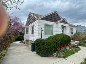 View of property exterior featuring driveway