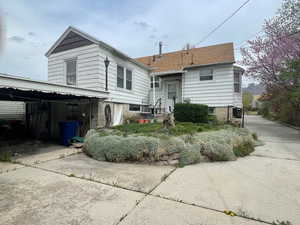View of back, shows Garage/Shop