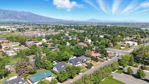 Aerial view of residential area featuring a mountain backdrop