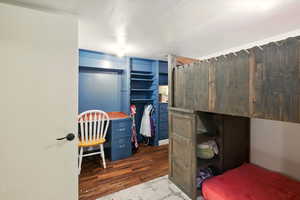 Bedroom featuring wood finished floors