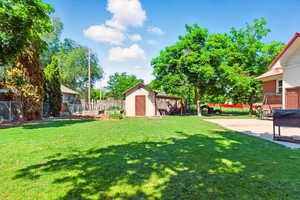 View of yard with a patio area