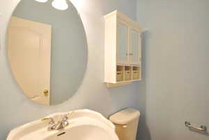 Bathroom with toilet and a sink