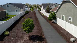 Fenced backyard with a residential view