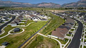 View of property location featuring nearby suburban area and a mountainous background