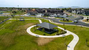 Aerial perspective of suburban area with a mountain backdrop