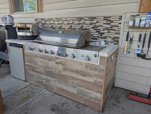 View of patio / terrace featuring a grill