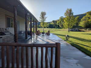 View of patio / terrace with a mountain view