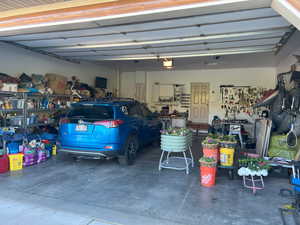 Garage featuring a garage door opener