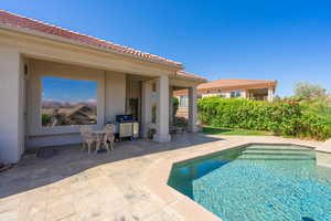 Swimming pool featuring a patio