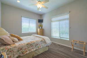Bedroom featuring baseboards, carpet, a ceiling fan, and recessed lighting