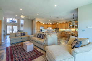 Living area featuring recessed lighting and ceiling fan