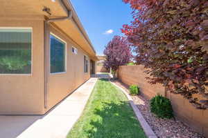 View of yard with a patio