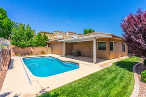 View of pool featuring a patio area, cooling unit, and a pergola