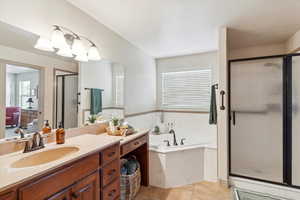 Private bathroom with garden tub and separate shower.