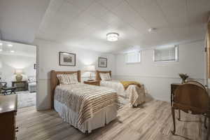 Bedroom with wood finished floors