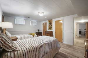 Bedroom with light wood-style flooring