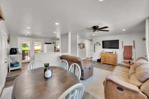 Dining area featuring recessed lighting, wood finished floors, ceiling fan, and baseboards