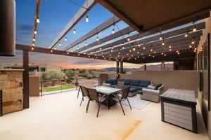 Patio terrace at dusk with an outdoor living space
