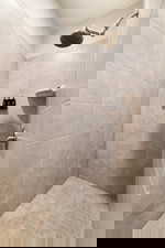 Bathroom with tiled shower