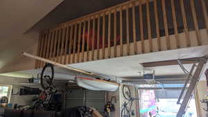 Garage featuring a garage door opener