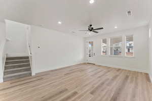 living room featuring stairway, ceiling fan, recessed lighting, LVP flooring