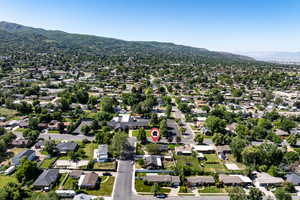 Aerial view of residential area featuring mountains