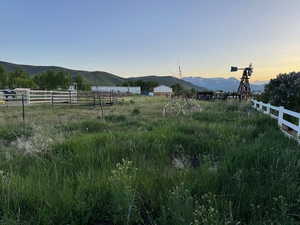 View of yard with a mountain view and a view of countryside
