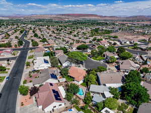 Aerial view of residential area with a mountain backdrop